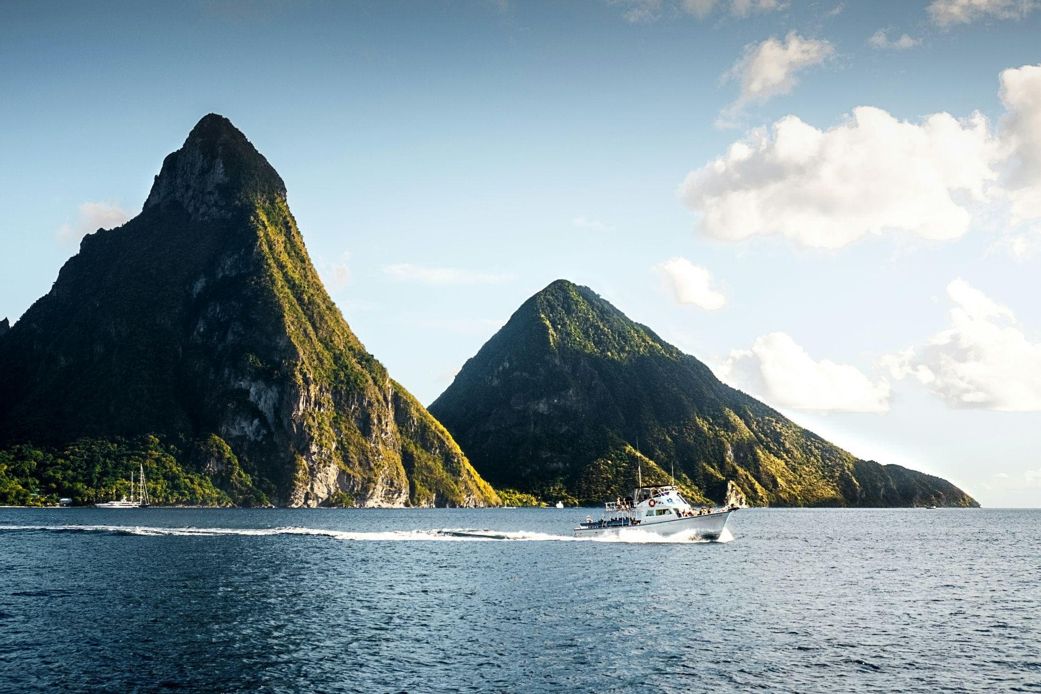 The Pitons and a boat off the coast of Saint Lucia