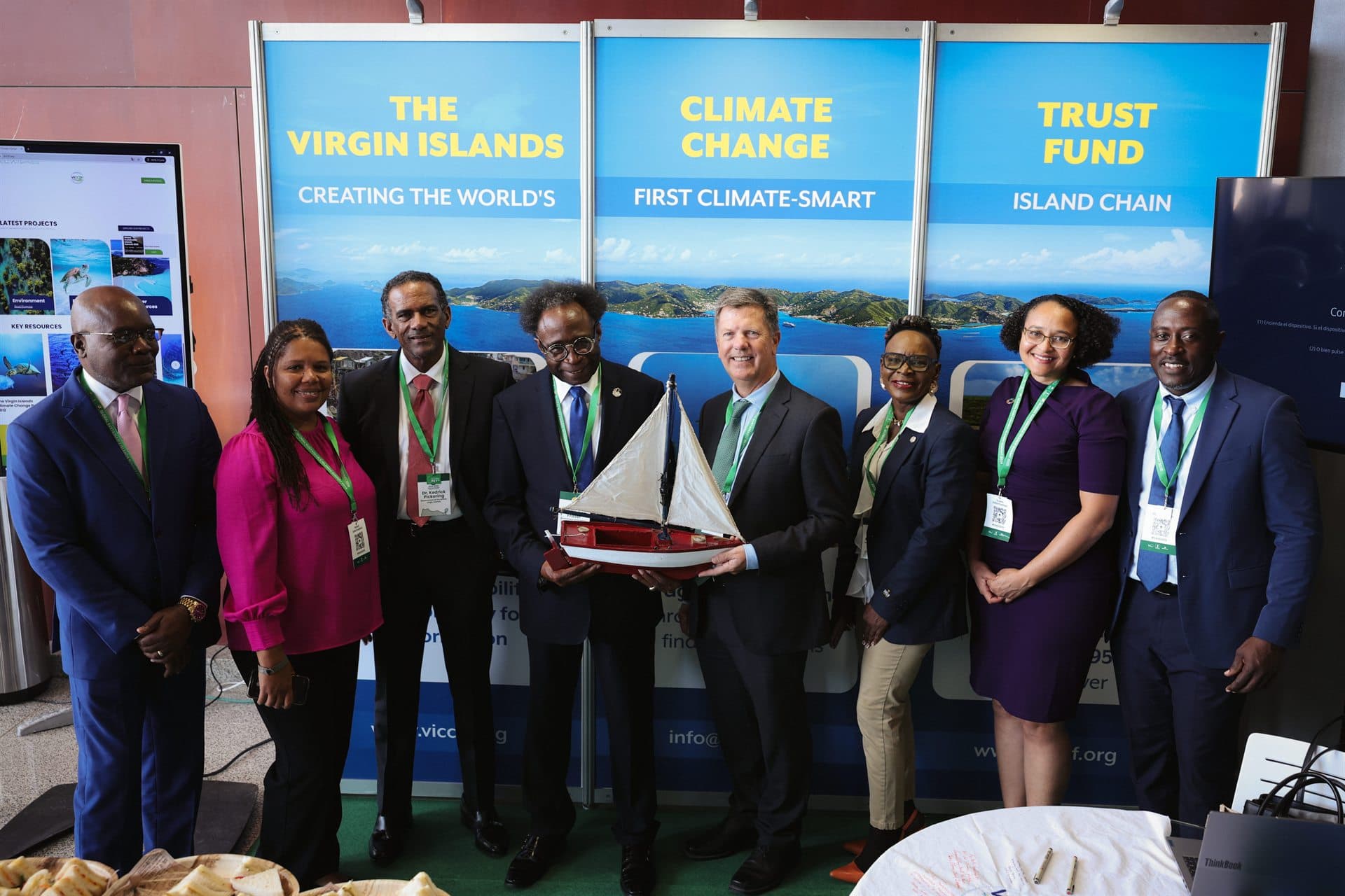 Group photo in front of the Virgin Islands Climate Change Trust Fund banners